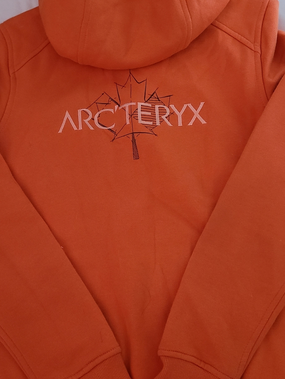 Arc'teryx Orange Hoodie with White Logo and Maple Graphic